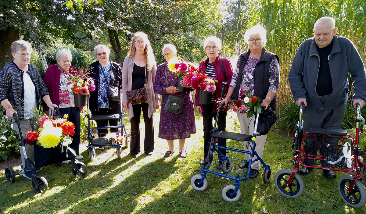 Med favnen fuld af blomster Med favnen fuld af blomster